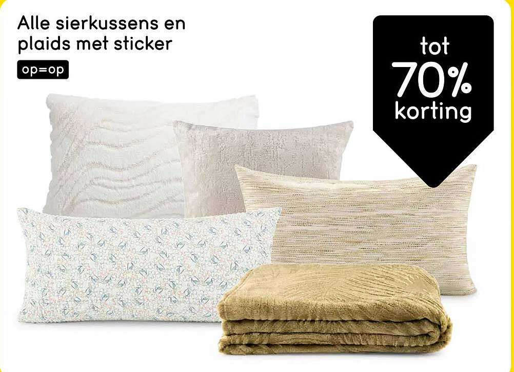 Alle sierkussens en plaids met sticker op=op