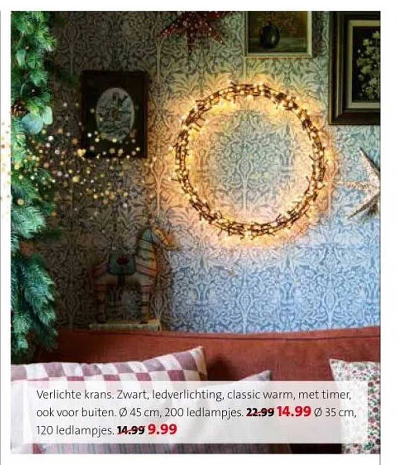 Verlichte krans. Zwart, ledverlichting, classic warm, met timer, ook voor buiten.