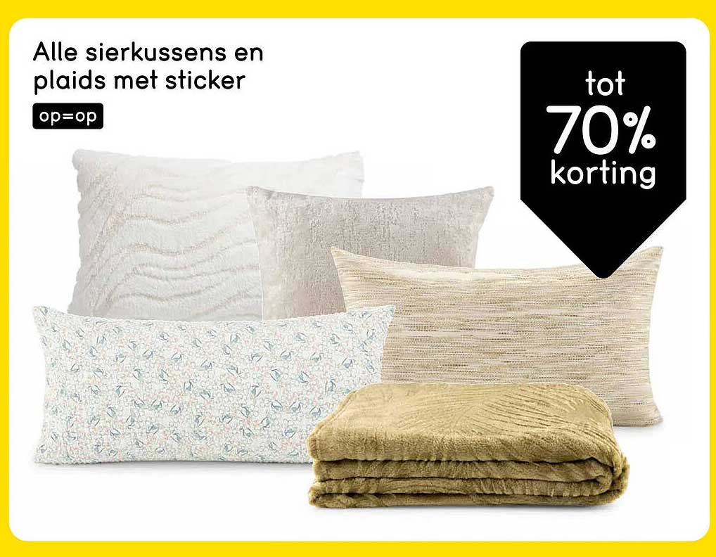 Alle sierkussens en plaids met sticker op=op
